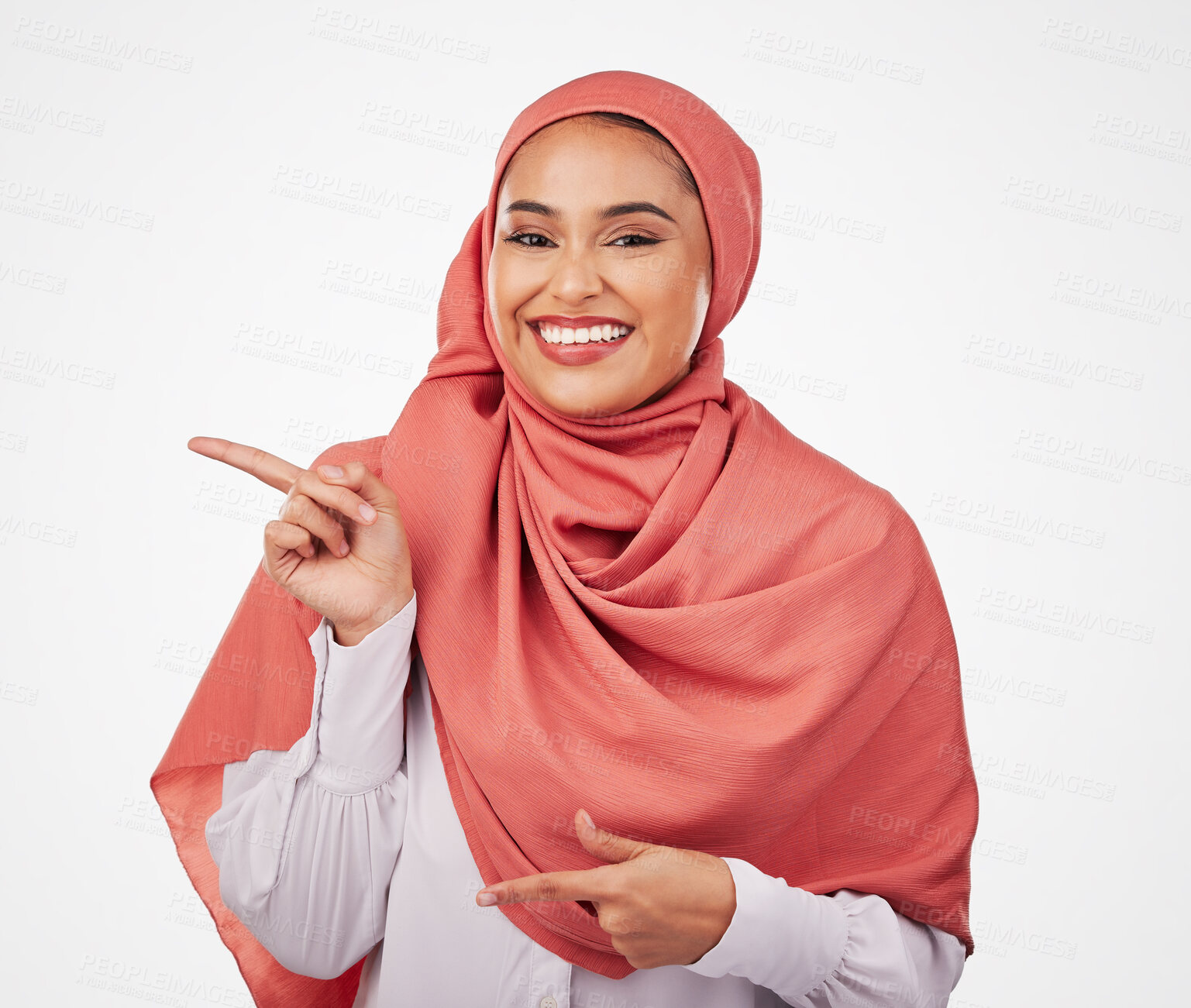 Buy stock photo Muslim, woman and pointing, advertising and presentation with smile in portrait isolated on white background. Business employee in hijab, communication and opportunity, multimedia and offer in studio