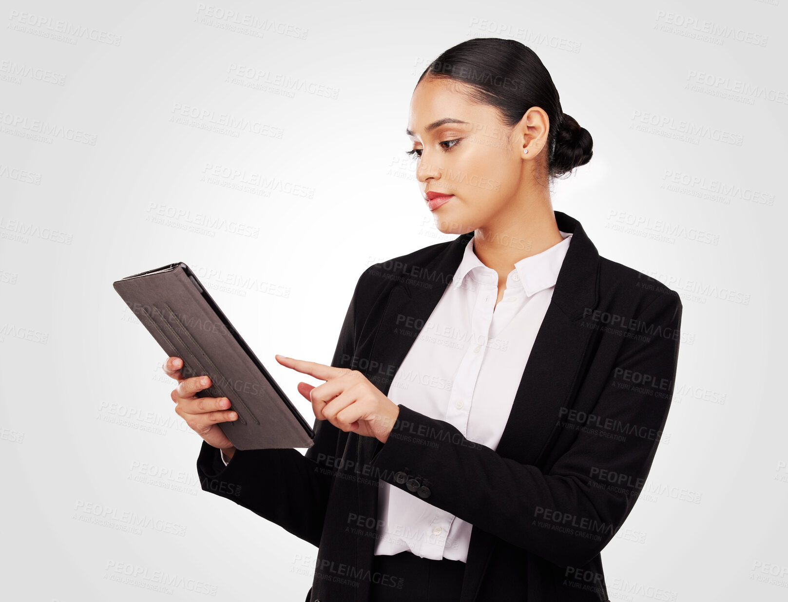 Buy stock photo Studio, woman and lawyer working with tablet for online news, research and work information on website or white background. Reading, mobile app and typing law notes, report or email feedback 