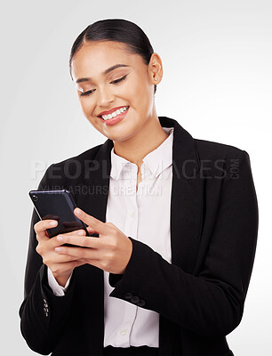 Buy stock photo Happy business woman, phone and typing in social media, networking or communication against a studio background. Female person or employee smile in online texting or chatting on mobile smartphone app