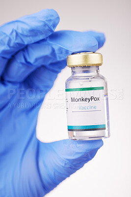 Buy stock photo Health, doctor and vaccine in hand, bottle with closeup and safety from monkey pox on white background. Person with glass container, immunity and liquid for healthcare, protect and medicine in studio