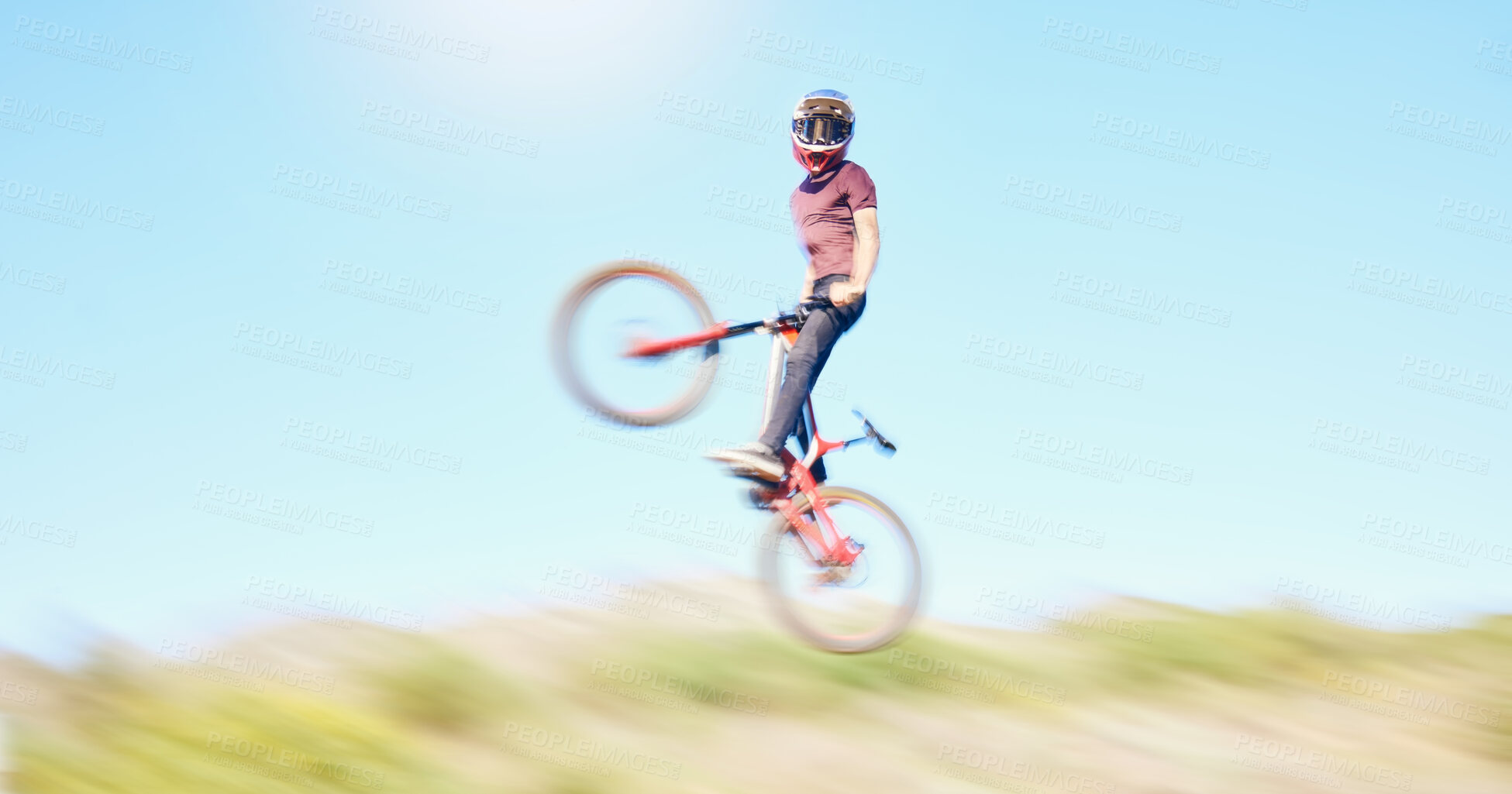 Buy stock photo Blur, air and cyclist cycling in nature training for a competition on trail or path in forest or woods. Freedom, wheelie stunt or athlete riding bicycle to jump in cardio exercise, fitness or workout