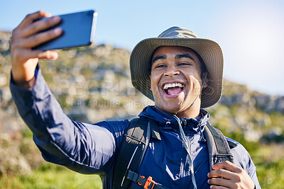 Buy stock photo Selfie, freedom and a man hiking in the mountains for travel, adventure or exploration in summer. Nature, smile and photography with a happy young hiker taking a profile picture outdoor in the sun