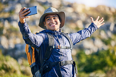 Buy stock photo Selfie, smile and a man hiking in the mountains for travel, adventure or exploration in summer. Nature, freedom and photography with a happy young hiker taking a profile picture outdoor in the sun