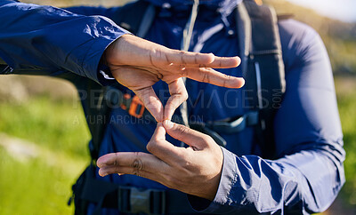 Buy stock photo Closeup, hiking and a hand of a person in nature for fitness, training or a sign for exercise. Morning, mountain and an athlete with a gesture for travel, sports or cardio walking or trekking