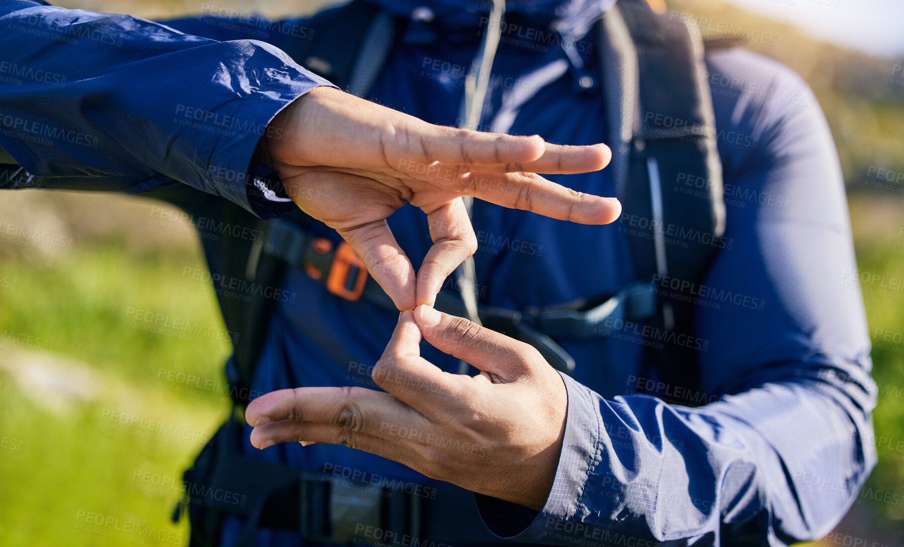 Buy stock photo Closeup, hiking and a hand of a person in nature for fitness, training or a sign for exercise. Morning, mountain and an athlete with a gesture for travel, sports or cardio walking or trekking