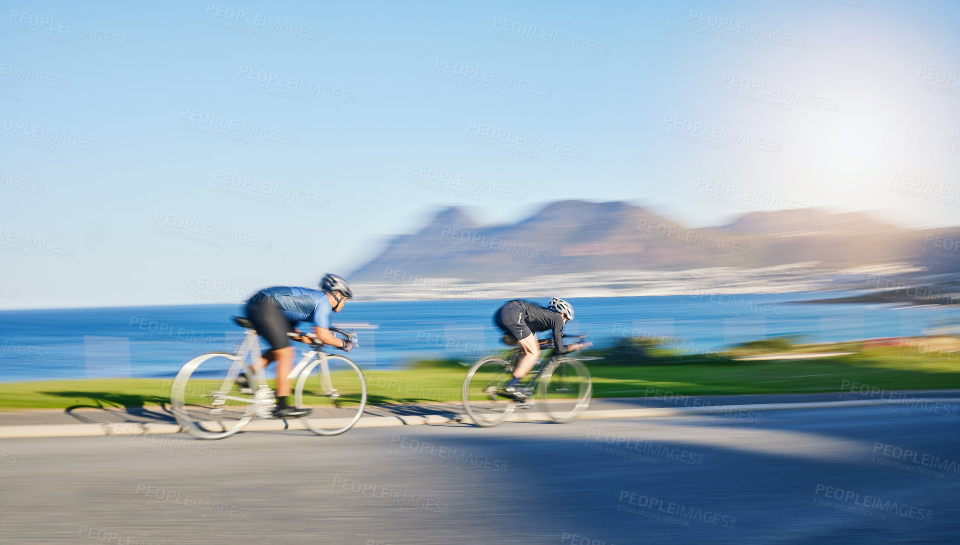 Buy stock photo Action, fitness and cyclist on bicycle on road together in mountain with helmet, exercise adventure and speed. Cycling race, nature and man with bike for fast workout, training motivation or energy.