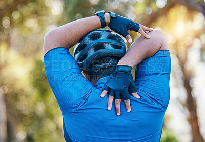 Buy stock photo Man, cyclist and stretching arms in nature in sports fitness, workout or outdoor exercise for wellness. Active male person, back or athlete in warm up, cycling or ready for training or adventure