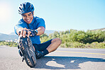 Happy man, cyclist and stretching on road in fitness, outdoor workout or cardio exercise in nature. Active male person or biker smile in happiness for body warm up or getting ready for cycling tour