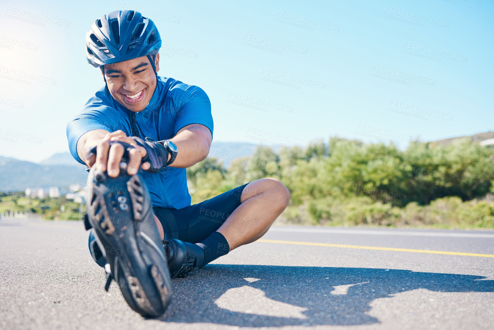 Buy stock photo Happy man, cyclist and stretching on road in fitness, outdoor workout or cardio exercise in nature. Active male person or biker smile in happiness for body warm up or getting ready for cycling tour