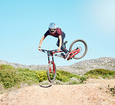Buy stock photo Action, air and man cycling in nature training for a sports competition on trail or path on mountain. Freedom, stunt or cyclist athlete riding bicycle to jump for cardio exercise, fitness or workout
