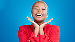 Beauty, smile and portrait of black woman in a studio with cosmetic, glamour and face routine. Happy, excited and young African female model with a cosmetology facial treatment by a blue background.