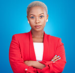 Beauty, crossed arms and serious black woman in a studio with cosmetic, self care and facial routine. Makeup, confidence and portrait of African female model with cosmetology face by blue background.