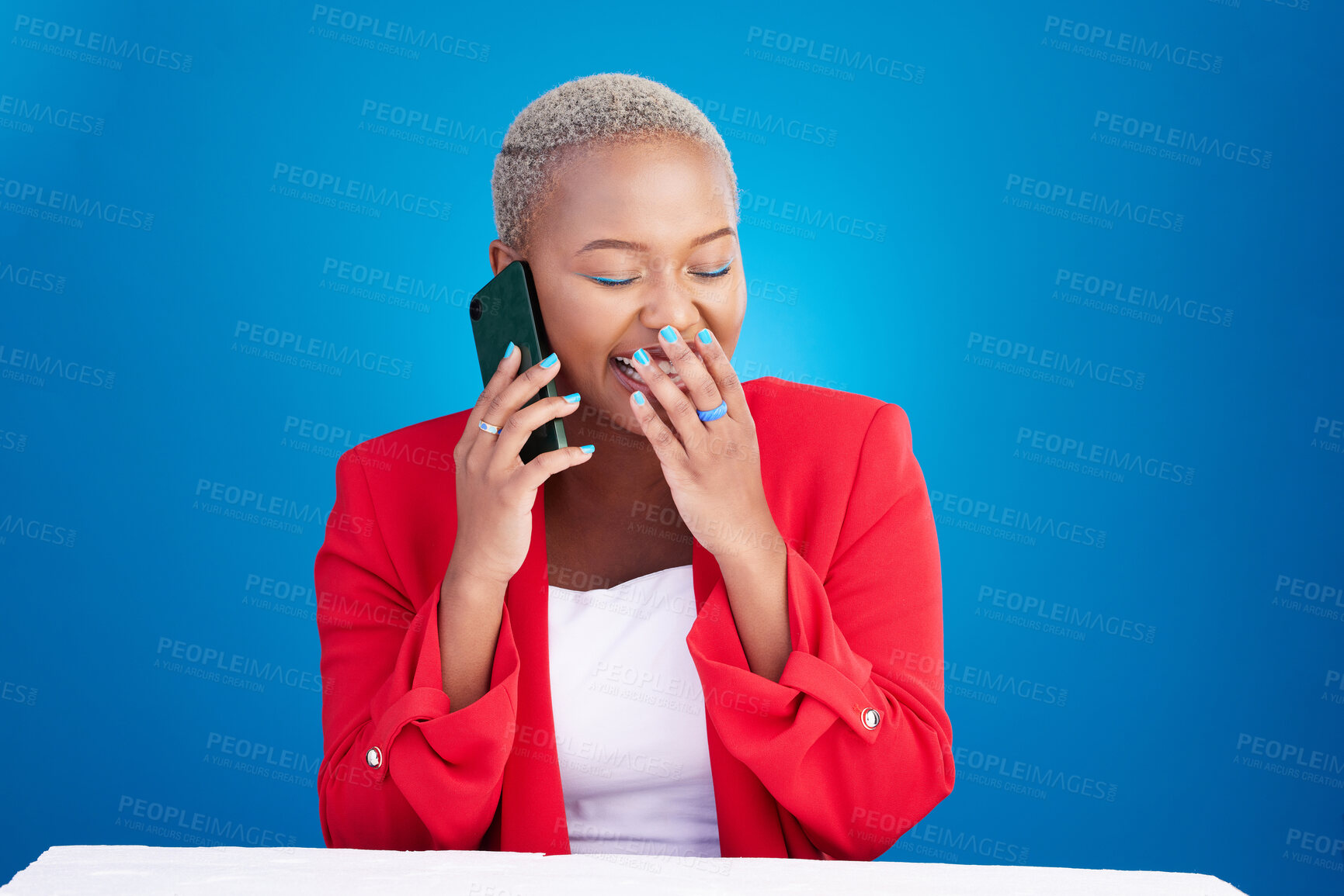 Buy stock photo Laughing, phone call and a woman in studio for communication, contact or conversation. Happy African person on a blue background with a smartphone for funny gossip chat, talking or networking