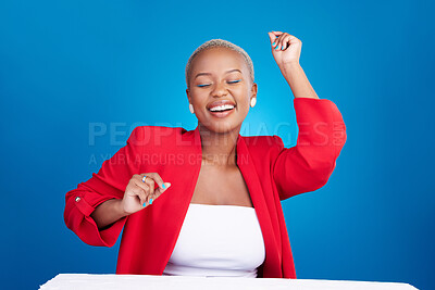 Buy stock photo Happy, dancing and a woman in studio with fun energy for celebration, good news or fashion. Excited African person on blue background to celebrate success, positive attitude or dancer moving to music