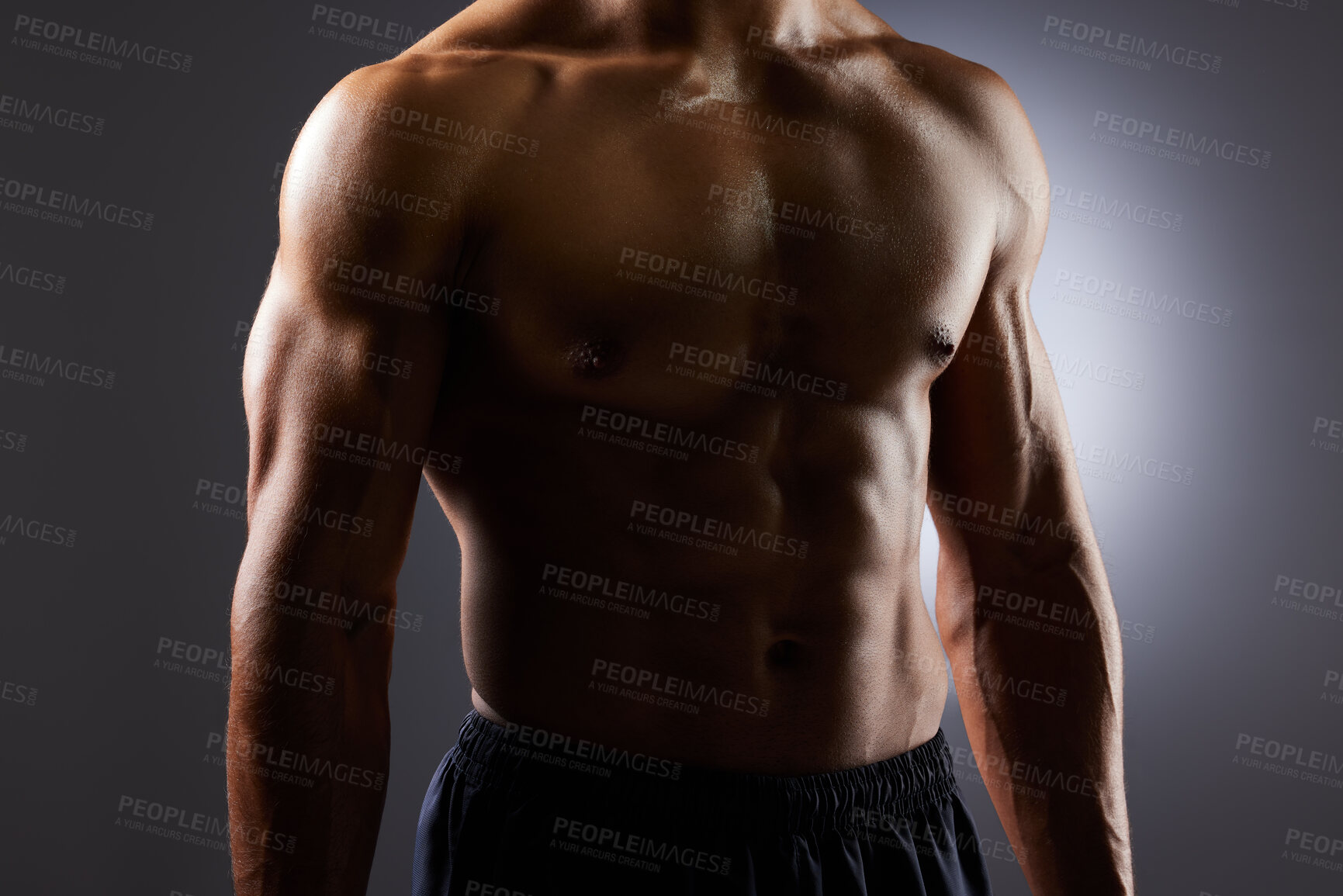 Buy stock photo Topless, muscle and torso of man in dark background for fitness inspiration, beauty aesthetic or strong body. Shadow aesthetic, male sports model or muscular body builder in studio with art lighting.