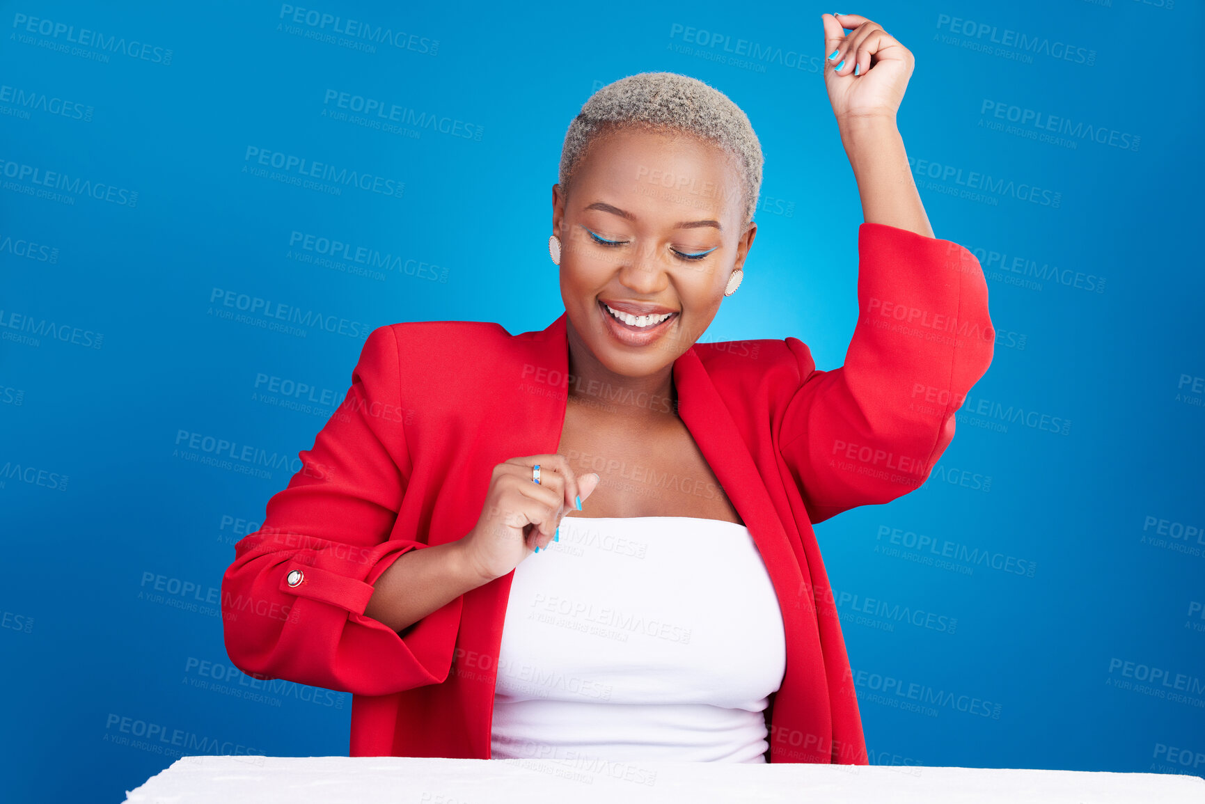Buy stock photo Dancing, happy and a woman in studio with fun energy for celebration, good news or fashion. Excited African person on a blue background to celebrate success, positive attitude and dancer moves
