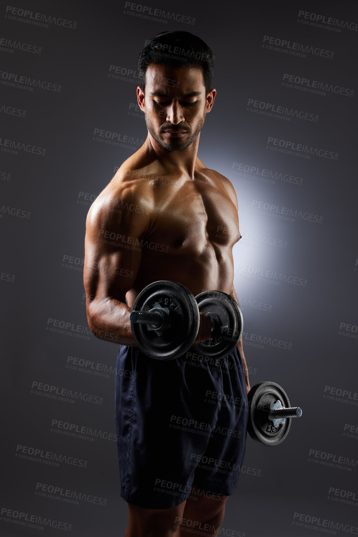 Buy stock photo Muscle, strong and studio man with dumbbell challenge results, arm workout development and body fitness progress. Dark shadow, gym equipment and sports athlete with training focus on grey background