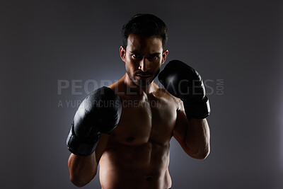 Buy stock photo Boxing, studio portrait and sports man with fitness challenge motivation, gym club commitment and fight power workout. Dark shadow, boxer training exercise and strong MMA athlete on grey background