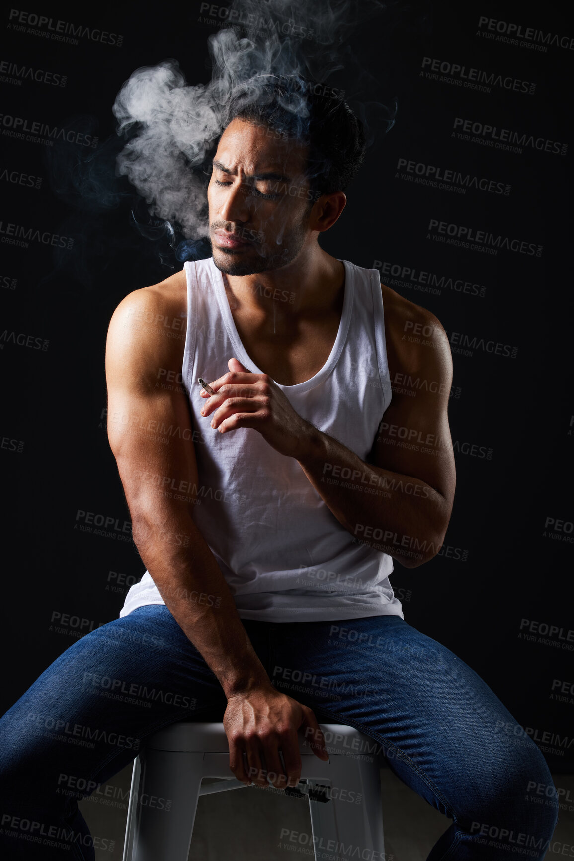 Buy stock photo Smoke, thinking and sexy man on chair in studio in fitness, beauty aesthetic and sensual fashion. Erotic art, sexual body and male model with muscle, cigarette and black background in dark lighting.