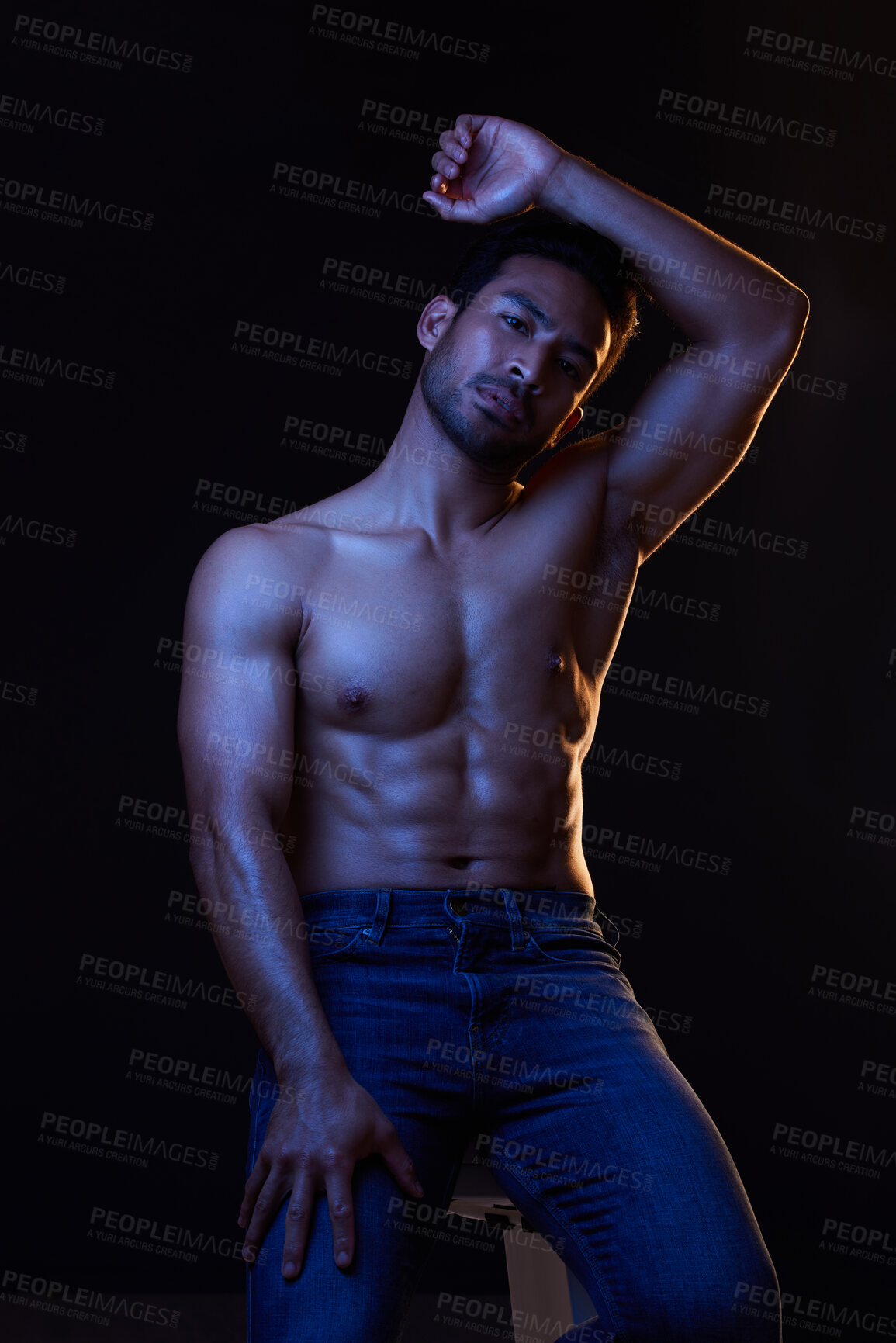 Buy stock photo Bodybuilder man, abs and dark in studio portrait, jeans or muscle for healthy body by black background. Young guy, fitness and silhouette with face, stomach or strong for health, shirtless or fashion