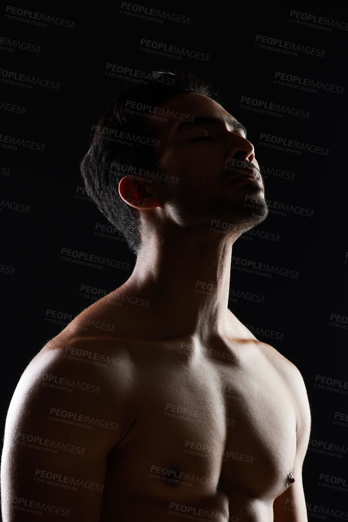 Buy stock photo Bodybuilder man, muscle and shadow in studio with wellness, healthy body and black background. Young guy, fitness and silhouette in dark, thinking and strong with ideas, health and shirtless for art