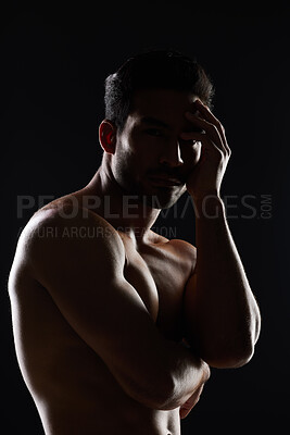 Buy stock photo Portrait, body and muscle of man in studio isolated on black background. Face, strong and serious athlete, bodybuilder and person workout, exercise or training in sports for health, power or fitness