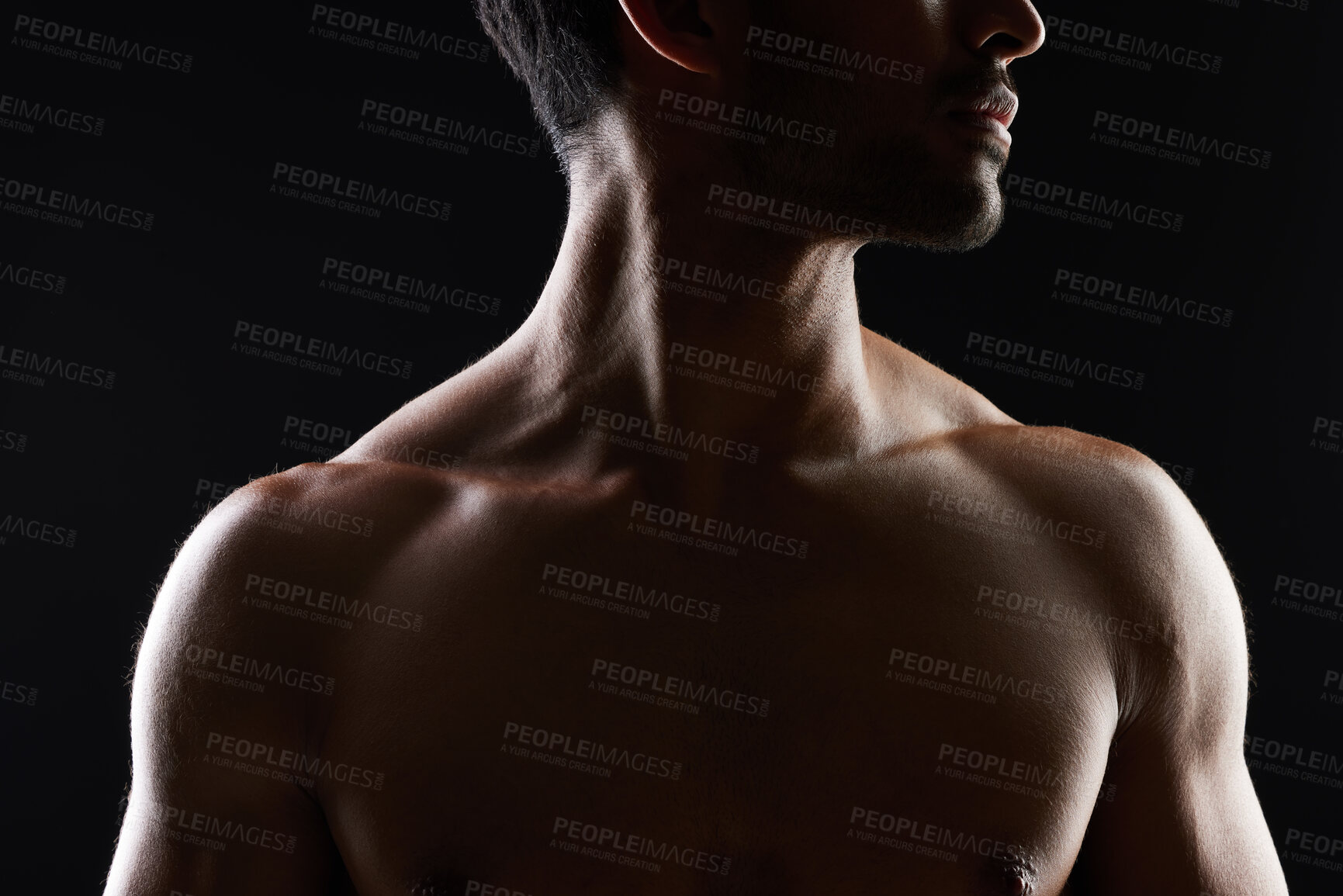 Buy stock photo Topless, muscle and sexy man in black background for fitness inspiration, beauty aesthetic or healthy body. Shadow, torso of strong male model or bodybuilder in dark studio with art lighting for gym.