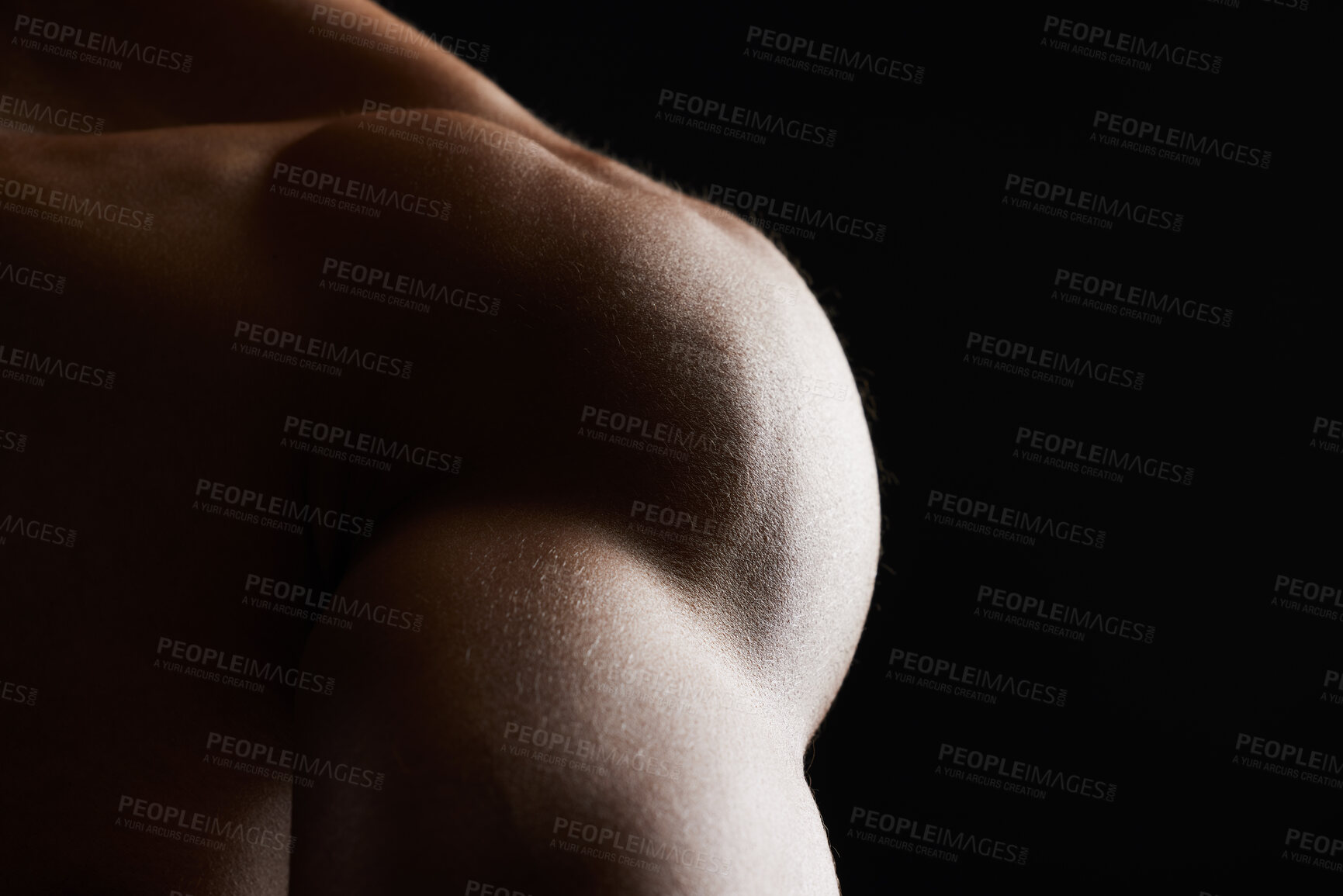 Buy stock photo Shoulder, closeup and muscle of man in studio isolated on a black background mockup space. Body, strong and arm of model in fitness, bodybuilder power and workout for health, wellness and exercise