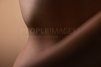 Buy stock photo Healthy, skin and body of woman closeup for beauty, cosmetics or wellness in brown background in studio. Skincare, texture and glow from dermatology, self care or natural treatment in salon or spa
