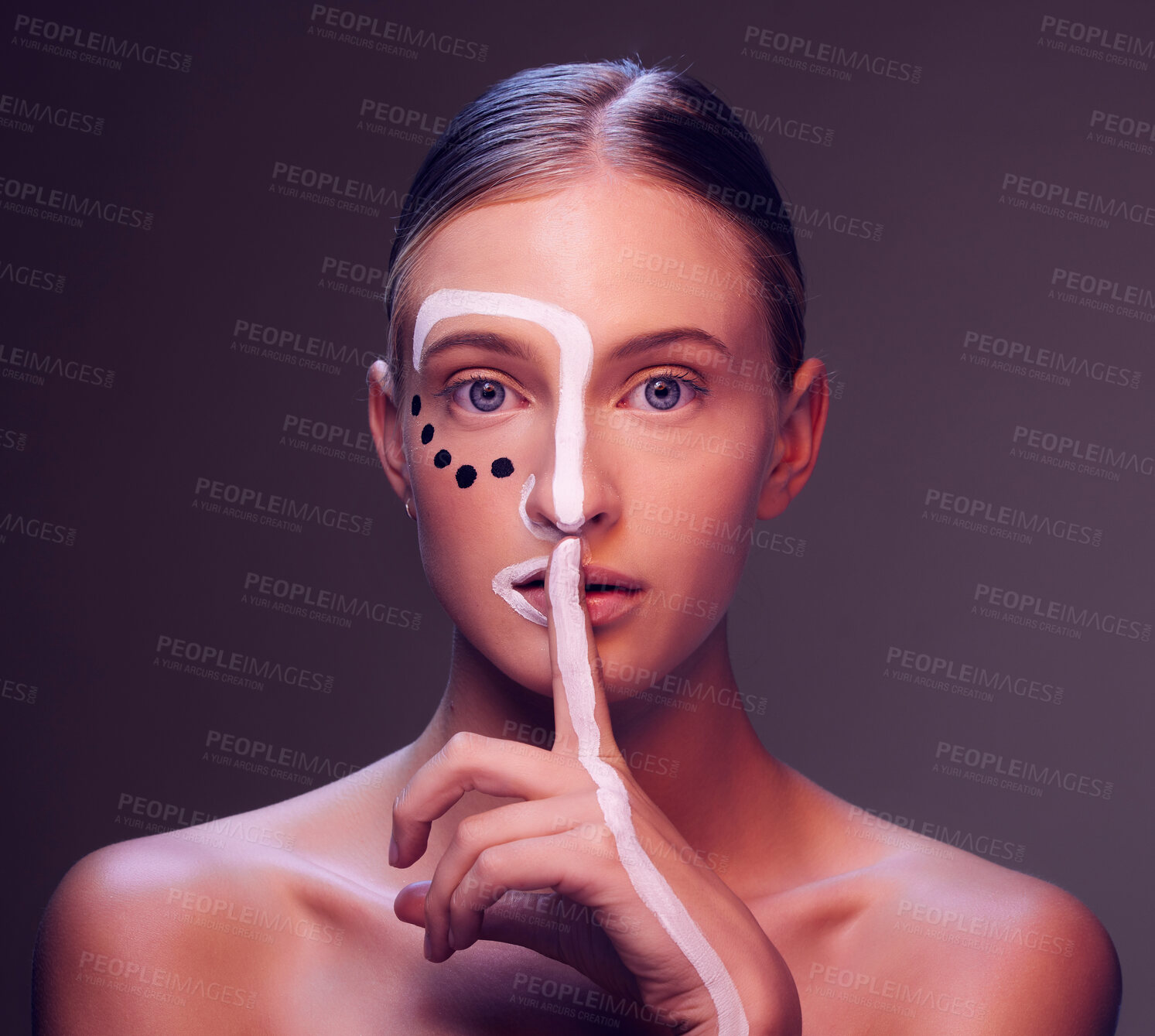 Buy stock photo Woman, face and paint in finger, lips or studio for art, secret or cosmetic for fantasy by dark background. Girl, model and facial painting with hush sign, mouth or creativity with makeup in portrait