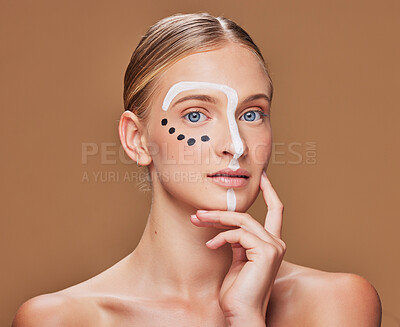 Buy stock photo Creative, makeup and portrait of woman in studio with art, beauty and abstract face aesthetic. Cosmetic, artistic and headshot of young female model from Canada with facial paint by brown background.