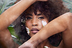 Beauty, mist and portrait of woman with flowers for skincare, cosmetic or self care routine. Fog, floral and headshot of young female model from Colombia with curly hair and facial makeup treatment.