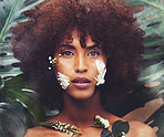 Flowers, art and portrait of black woman with beauty, skincare and creative or eco friendly cosmetics from nature. Natural, face and model with flower makeup and healthy organic skin care in forest