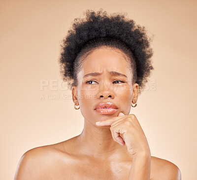Buy stock photo Skincare, choice and black woman in thinking in studio with choice, question or why on brown background. Confused, face and African lady model with decision, emoji or choose beauty wellness treatment