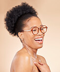 Beauty, laugh and happy black woman in studio for natural cosmetics, satisfaction or feel good wellness on brown background. Smile, laughing and African lady model excited about skincare glow results