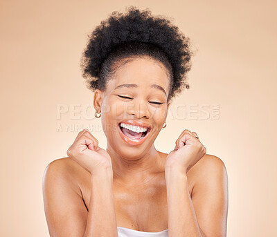 Buy stock photo Skincare, excited and young black woman in a studio with cosmetic, glow and natural face routine. Happy, smile and African female model with facial dermatology treatment isolated by brown background.