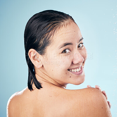 Buy stock photo Shower, portrait or happy woman cleaning back, hair or body for wellness in studio on blue background. Smile, beauty or wet person washing or grooming for healthy natural hygiene or skincare to relax
