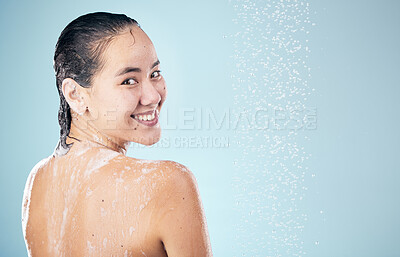 Buy stock photo Shower, mockup or happy woman cleaning back, hair or body for wellness or skincare on blue background. Smle, space or wet person washing and grooming for healthy natural hygiene or beauty to relax