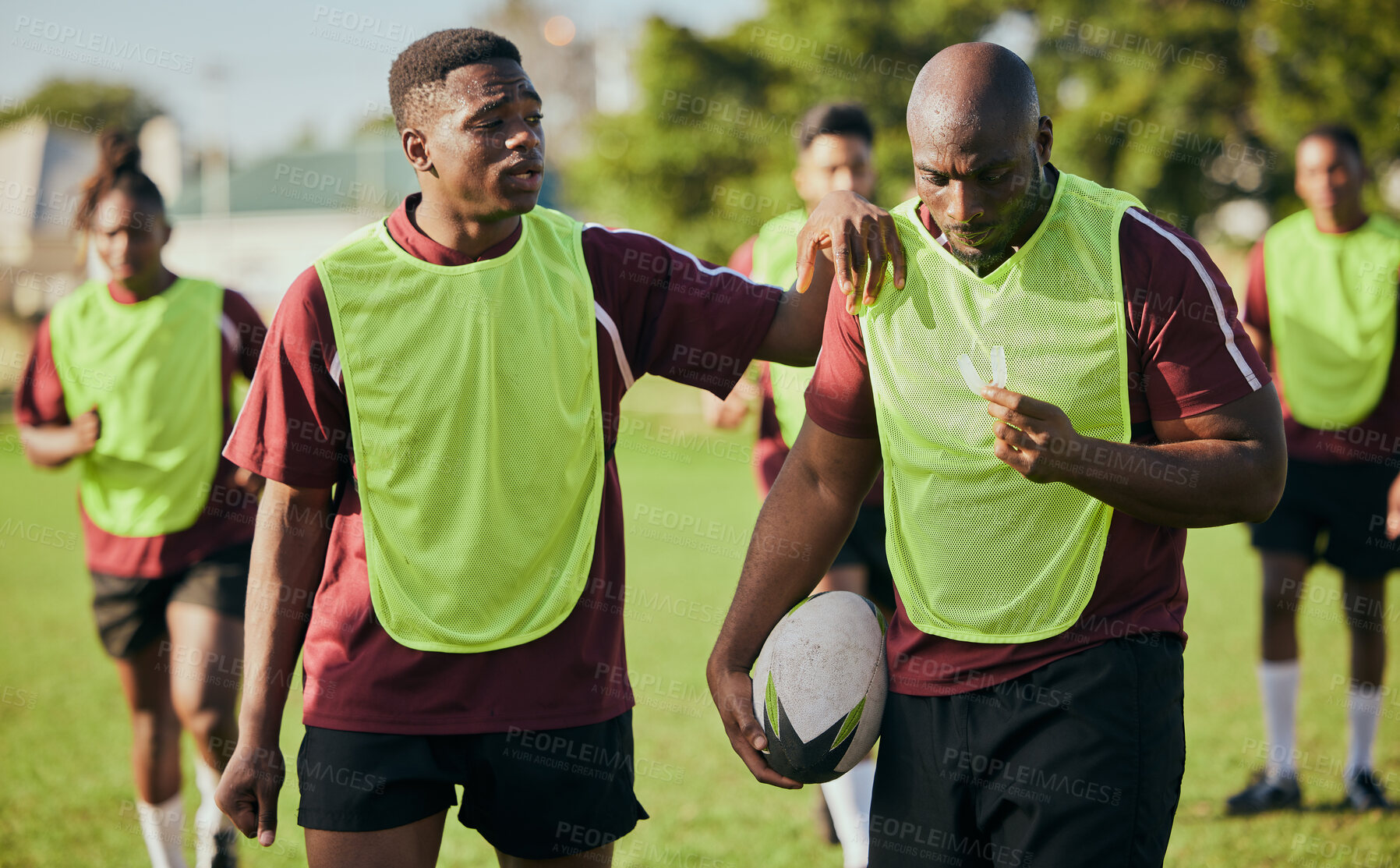 Buy stock photo Sports, fitness and men for rugby training, workout and exercise on grass field for competition. Teamwork, collaboration and athletes with ball for support in practice, match and game for challenge