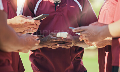 Buy stock photo Sports, group and phone with hands of people on field for networking, teamwork and social media. Contact, fitness and health with closeup of friends in stadium for internet, communication and app