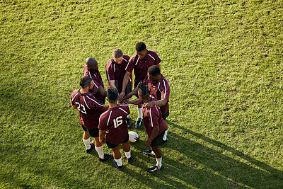 Buy stock photo Soccer group, men and hands for motivation, support and game strategy talk on sport field. Above, grass and exercise of a training team together with celebration and friends outdoor for competition