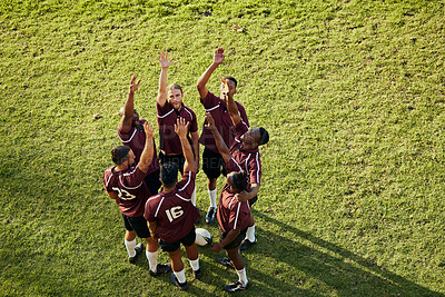 Buy stock photo Raised hand, sports and rugby people celebrate teamwork, team building or winning game, match or tournament competition. Success motivation, top view winner and circle of men happy, excited or cheers