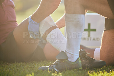 Buy stock photo First aid, sport injury and hands on leg with rugby accident, fitness and massage on a field. Training, workout and physical therapy of knee pain at game with healthcare emergency from exercise 