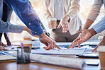 Business people, hands and meeting with documents in planning, strategy or ideas together at office. Closeup of group in project plan, collaboration or teamwork on paperwork or blueprint at workplace
