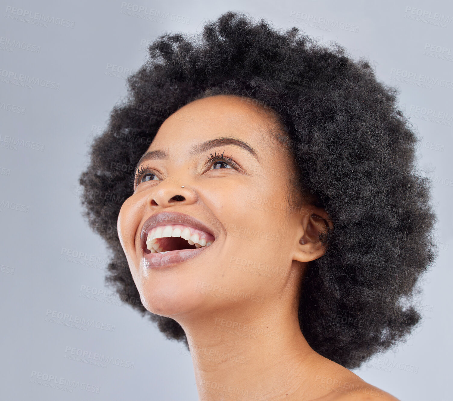 Buy stock photo Smile, skincare and young black woman in a studio for cosmetic, glamour and face routine. Health, happy and African female model with hair treatment for afro and makeup isolated by white background.