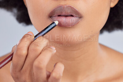 Buy stock photo Makeup, cosmetics and lips of woman with pencil in studio for wellness, skincare product and beauty. Salon, aesthetic and face zoom of person with lipstick or lip liner for glamour, makeover and glow