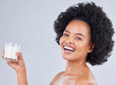 Buy stock photo Woman, portrait and milk glass in studio for healthy diet, detox or calcium on white background. Happy african model, dairy drink or smoothie of vanilla milkshake for nutrition, weight loss or beauty