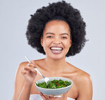 Health, portrait and black woman with a salad in studio for diet dinner, lunch or supper. Happy, wellness and young African female model eating vegetables for vegan snack or meal by white background.