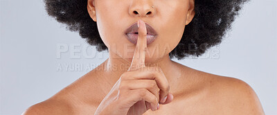 Buy stock photo Beauty, secret and woman with finger on lip as quiet or privacy sign isolated in studio white background. Closeup, face and person silence hand gesture for skincare, gossip or confidential whisper