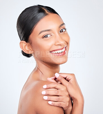 Buy stock photo Portrait, happy woman and natural beauty in studio with healthy dermatology, aesthetic glow and shine on white background. Indian model, wellness and smile for pride in skincare, cosmetics and facial